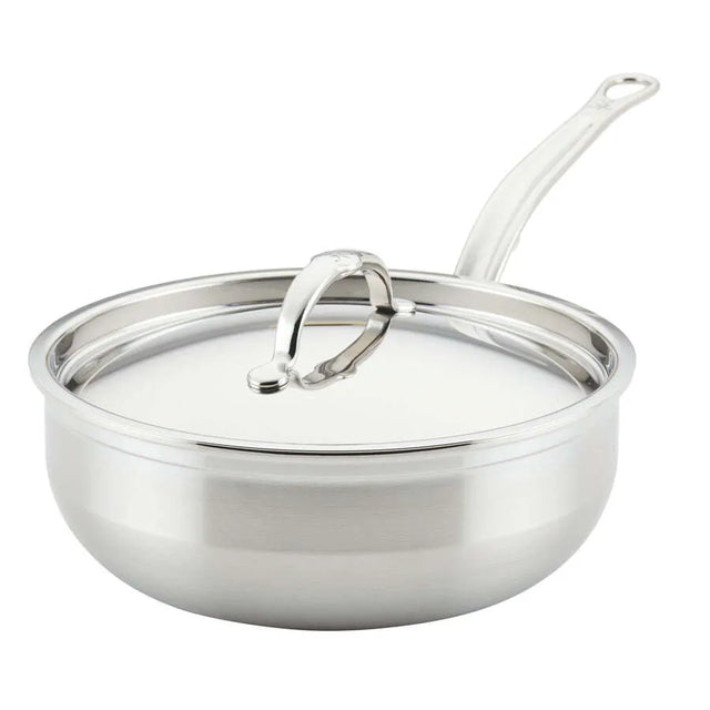 A shiny Hestan Probond Essential Pan, 3.5qt pan, with a long handle and fitted lid featuring a curved top handle. The smooth, reflective stainless steel finish and slightly flared sides stand out against the plain white background.