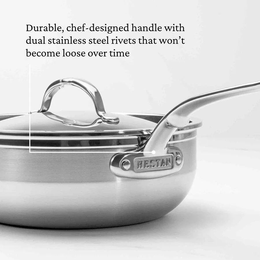 The 28cm Hestan Probond Essential pan is a stainless steel saucepan with a lid and a sturdy, chef-designed handle featuring dual stainless steel rivets stamped with HESTAN—ensuring durability that won’t become loose over time.
