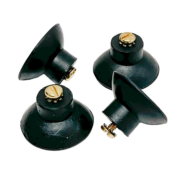 Three black TableCraft Products suction cups with gold screws on top are arranged on a white background. Made of rubber and dishwasher safe, the cups are positioned at different angles, highlighting their round bases and hollow centers.
