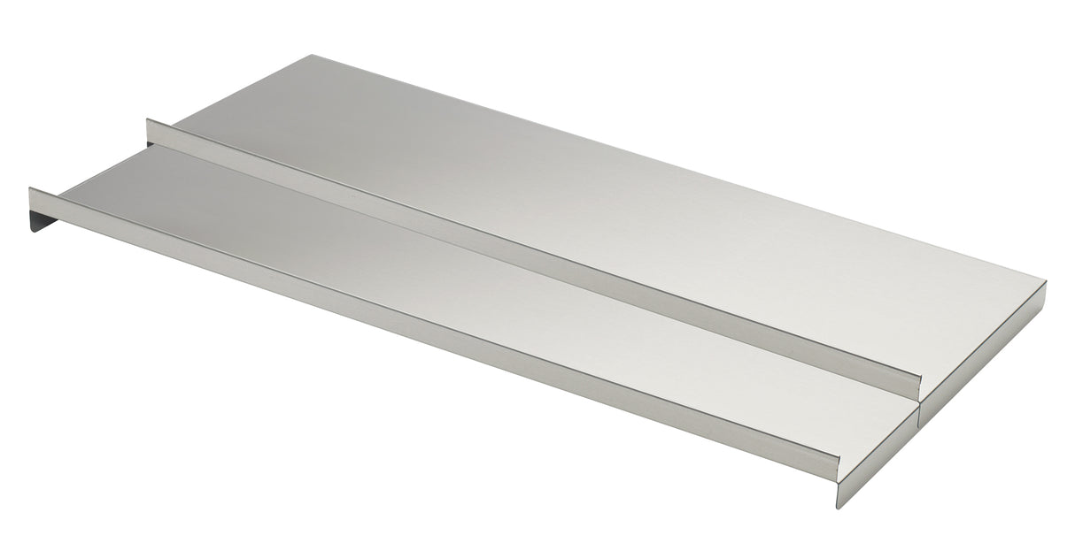A photo of two rectangular, flat, stainless steel shelves with raised side edges, stacked together. The shelves have a smooth, shiny, silver finish and are oriented at an angle on a plain white background.