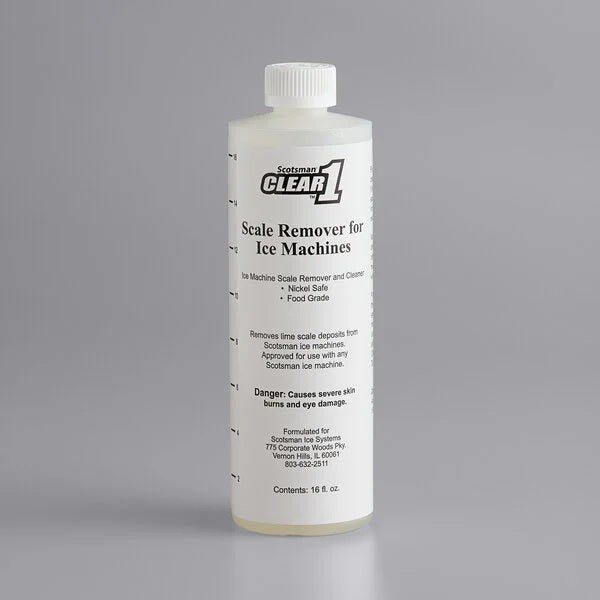 A clear plastic bottle labeled “Scotsman Clear 1 Ice Machine Cleaner” stands upright against a gray background. The white label details this 16 oz scale remover and cleaner, featuring safety warnings and usage instructions.