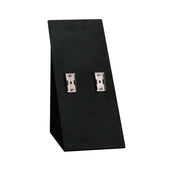 A black, angled stand with two silver metal clips attached to its front, set against a white background. This minimalist plastic stand is ideal for showcasing small items such as jewelry or accessories.