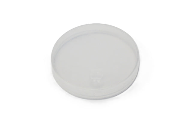 A translucent, round plastic petri dish with a Replacement Lid, shown on a plain white background. The dish is empty and viewed from above, revealing its simple, clean design and dishwasher safe construction.