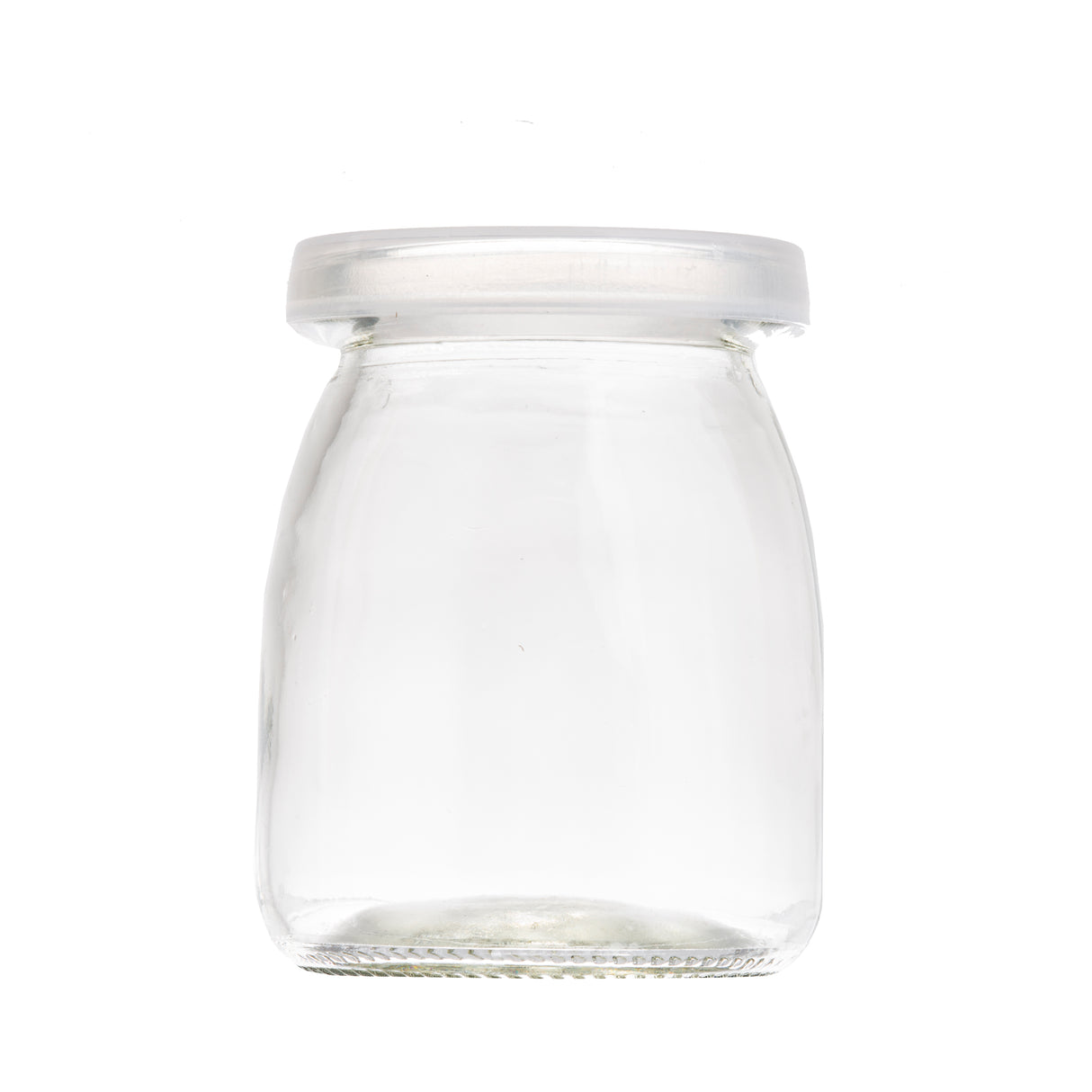 A clear, empty glass jar with a wide base, rounded shoulders, and a narrow neck. This single-serve jar features a smooth, translucent plastic lid. The background is completely white, making the jar’s details clearly visible.