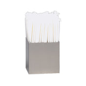 A square, stainless steel dispenser holds a bundle of upright white paper napkins. The napkins are neatly packed and fan out slightly at the top. The plain white background emphasizes the clean, simple design reminiscent of a straw holder.