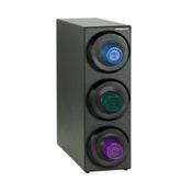 A black rectangular cup dispensing cabinet with three circular compartments, each holding a colored lid—blue on top, green in the middle, purple at the bottom. Each NSF cup dispenser features a label and an interchangeable gasket on its textured surface.