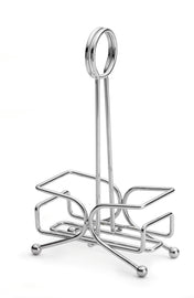 A TableCraft metal napkin holder with a chrome plated finish, featuring a vertical handle topped with a round loop and a butterfly-shaped base formed by curved metal rods, standing on four round feet—a stylish complement to any salt & pepper shakers rack.