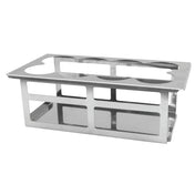 A stainless steel test tube rack with rectangular side openings and circular holes on top for holding test tubes or 16 oz bottles, displayed against a plain white background. The metal rack has a sturdy, rectangular structure suitable for laboratory use.