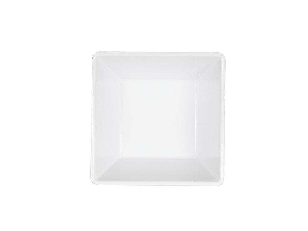 A plain, empty, white square melamine bowl is photographed from above against a white background, creating a minimal and clean look with sharp angles and smooth surfaces.
