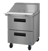 A sleek, industrial Hoshizaki SR27B-12MD2 Steelheart Series prep table with two pull-out drawers, a cutting board surface, lift-up lid, and four caster wheels—ideal for food preparation and storage in busy restaurant kitchens.