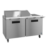 A stainless steel mega top refrigerator prep table with two doors, black handles, lockable caster wheels, and a raised covered section on the countertop for ingredient storage and preparation.
