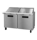 A large stainless steel mega top refrigerator on wheels with two doors, two top lift-up lids, and a wide white prep surface. The unit features recessed handles and a clean, industrial design, ideal for restaurant or food service settings.