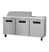 A commercial Sandwich Top Refrigerator from the Hoshizaki SR72B-12 Steelheart Series, this stainless steel food prep table features three undercounter refrigerator doors, black handles, a raised covered section on top, and four wheels for easy mobility.