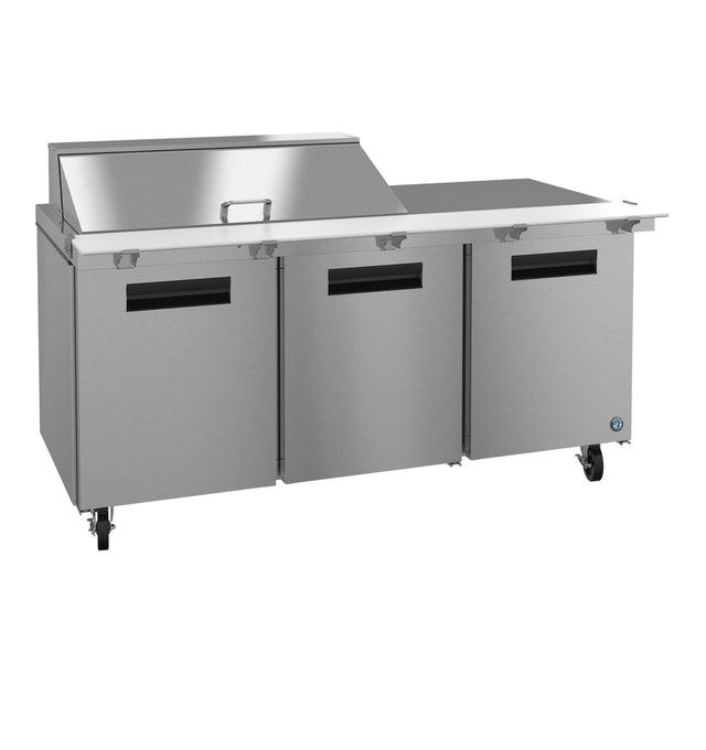 A large Hoshizaki SR72B-18M stainless steel commercial prep table with three cabinet doors, a flat counter surface, raised rear mega top refrigerator section with a closed lid, and four wheels. Clean, modern industrial design suits any kitchen.
