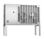 A rectangular industrial Remote Condenser stands on four legs. Vented panels on the right reveal two large internal fans, and a KMS-1402MLJ logo sticker sits on the bottom left. The silver-gray unit has a utilitarian design against a plain white background.