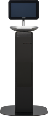 A tall, black, rectangular FreshServe Scale self-service kiosk with a wide base, central column, touchscreen monitor on top, and metallic tray beneath the screen stands upright against a white background.