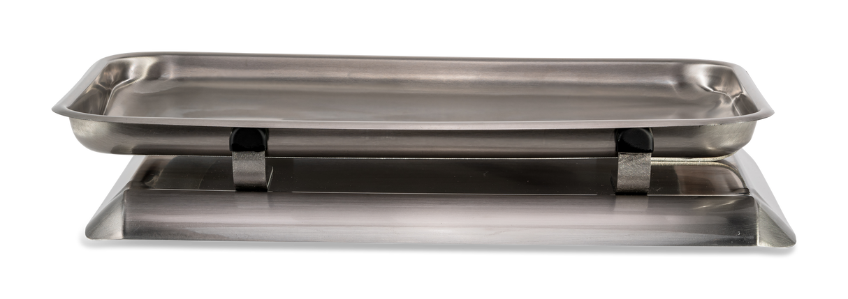A rectangular, stainless steel chafing dish with rounded corners and shallow sides, designed like a classic fish pan, stands on a matching base with two support brackets underneath. The smooth, reflective surface contrasts against the plain white background.