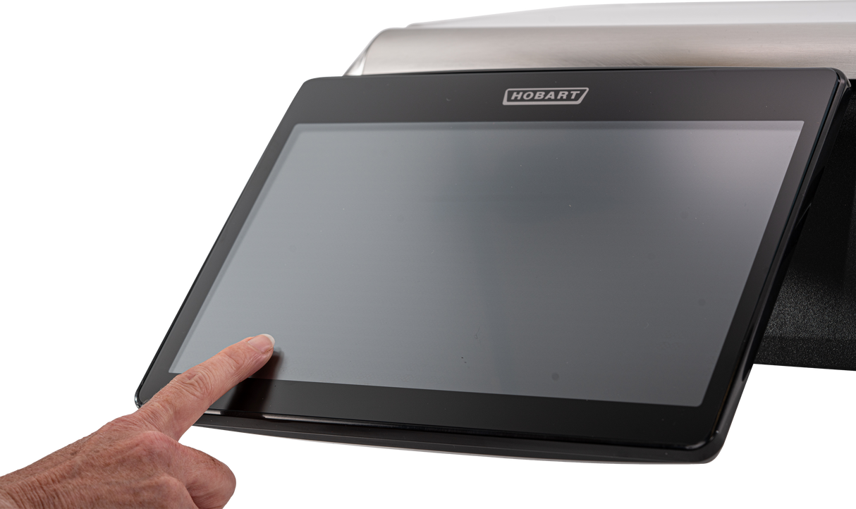 A hand with a pointing finger touches the bottom left corner of a large, black Hobart GTI touchscreen display. The background is plain white, emphasizing the interaction with this NTEP-certified GTI Scale/Printer screen.