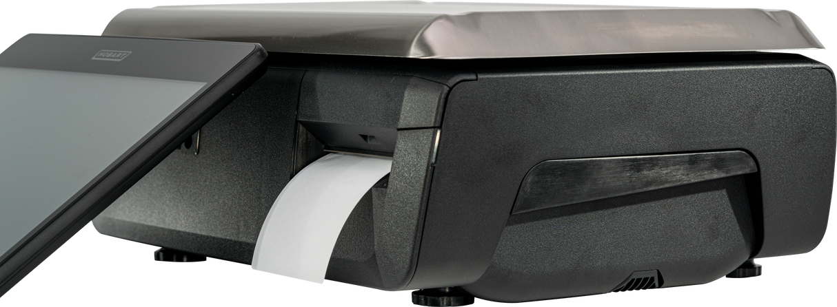 A close-up of a black GTS Printer with a touchscreen panel and receipt printer. The device features a metal top, runs on a Linux operating system, and prints a white receipt from the side slot while sitting on four small feet.