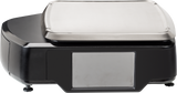 A modern HTS service scale with a large, rectangular stainless steel weighing platform and a digital display screen on the front. The black body features metallic accents and is designed for enhanced label capacity, set against a plain white background.