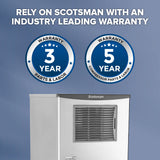 Partial view of a Scotsman commercial ice maker below two blue badges. Left badge reads “3 YEAR WARRANTY PARTS & LABOR.” Right badge: “5 YEAR WARRANTY COMPRESSOR PARTS & LABOR.” Text above: “RELY ON SCOTSMAN WITH AN INDUSTRY LEADING WARRANTY.”.