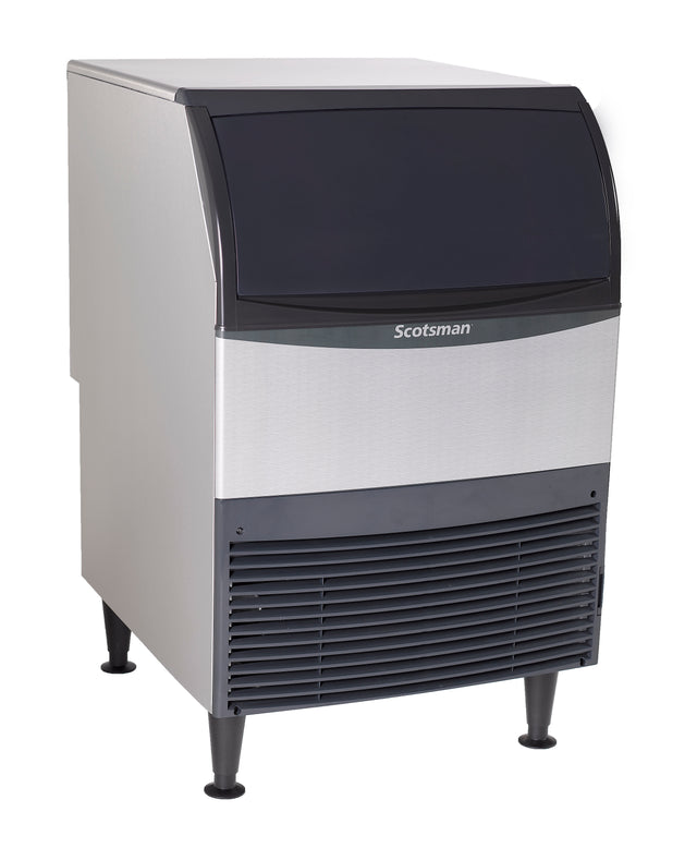 A stainless steel undercounter ice maker with a black top door, front air vents, and four short legs. The Scotsman commercial ice machine boasts a modern, boxy design and is shown against a white background.