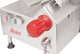 Close-up of a Berkel automatic slicer, featuring a large red dial with numbered settings, power and blade buttons, and a silver metallic body with the Berkel logo in red. This gravity feed slicer includes control buttons for “Blade,” “Power,” and “Automatic.”.