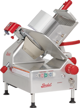 A commercial-grade Berkel gravity feed slicer with a stainless steel body, red knobs, 12 carbon steel knife, circular blade, safety guard, control buttons, four legs, and both manual and automatic settings.