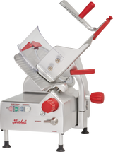 A commercial gravity feed slicer with a red handle and knob, labeled Berkel. It features control buttons, a tilted metal slicing platform with protective guard, and an adjustable 12 carbon steel knife. The design is primarily silver with red accents.