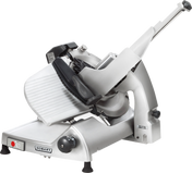 A silver Hobart HS6N-1 Heavy Duty Meat Slicer with a tilted, grooved sliding tray and a 13 CleanCut knife. Features include adjustment knobs, red power button, black feet, and an industrial finish for effortlessly slicing deli meats or cheeses.