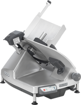 A heavy duty meat slicer, this commercial Hobart features a tilted silver base, adjustable food carriage, 13 CleanCut knife, safety guard, control panel with buttons, and top handle. The unit stands on black feet against a plain white background.