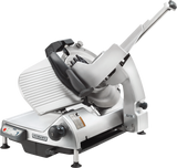 A Heavy Duty Meat Slicer with a shiny metallic body, large circular blade, adjustable thickness guide, and a black handle for safely pushing meat across the blade. Control buttons and power switch appear on the front panel for easy operation.