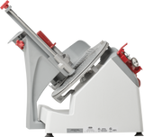A side view of the Berkel X13-PLUS manual food slicer with a tilted silver blade, gray body, and red safety features. The slicer includes adjustment knobs, a handle, and serrated platform for holding food, set against a plain white background.