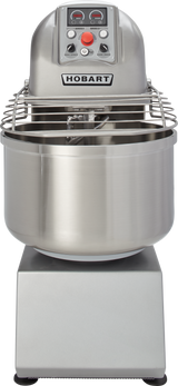 A commercial Hobart Spiral Mixer with a 130-pound capacity features a large stainless steel mixing bowl, spiral dough hook, protective wire guard, and control panel; its sturdy metal base displays a prominent HOBART label on the front.