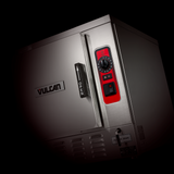 A close-up view of a stainless steel Vulcan boilerless countertop steamer with a black handle labeled OPEN, a logo, and a red control panel featuring a dial and buttons, set against a black background.