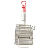 The TableCraft Burrito Fry Basket is a nickel plated metal grilling basket with parallel wire bars, a rectangular shape, and a long handle with a red plastic grip. It stands upright with a clasp on the side to securely hold your food.