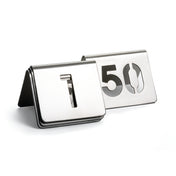 Two metallic table number signs from the TableCraft number tent set are displayed. The front sign shows a cut-out number 1, and the one behind shows 50. Both are folded into tent shapes and made of brushed stainless steel.