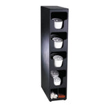 A tall, black lid organizer with five open shelves holds white plastic cups with clear lids. The bottom shelf serves as a straw organizer, featuring white stir sticks and red napkins in two polystyrene compartments on a white background.