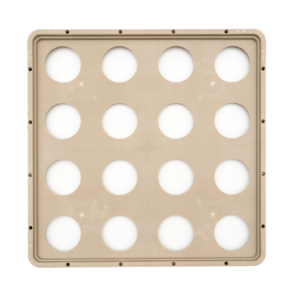 A square beige plastic tray, resembling a Traex Rack-Master warewashing rack, features sixteen circular cutouts in a 4x4 grid. Viewed from above against a white background, it has rounded corners and small holes along the edges.