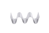 A silver, stainless steel object with a smooth, wavy zigzag shape and three peaks stands vertically on a white background. This Taco Taxi Server, with sharp edges and a shiny surface, holds 2-3 tacos securely.