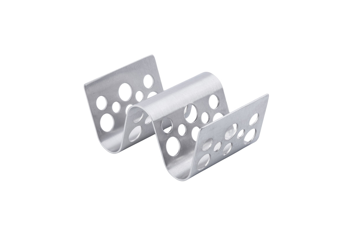 A stainless steel Taco Taxi Server bracket with a wavy, S-shaped design. Both upright ends feature multiple round holes in varying sizes. This sleek bracket holds 1-2 tacos and is photographed on a plain white background.