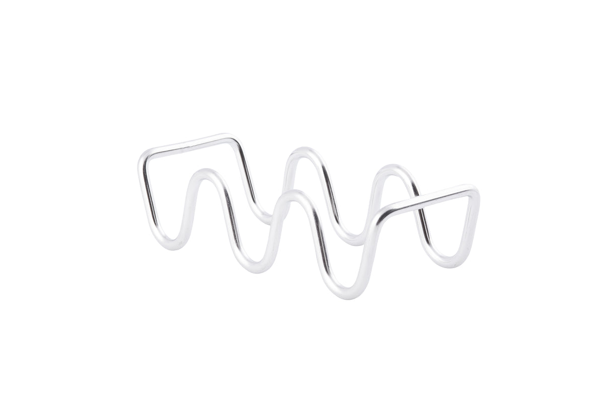 A metal object made of a single, shiny silver rod bent into wavy peaks and valleys stands on a white background. This minimalist, abstract sculpture is actually a stainless steel taco holder—dishwasher safe for easy cleaning—perfect as a Taco Taxi Server.