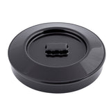 A round, glossy black tortilla warmer made of polypropylene with a matching lid. The ridged handle sits at the center, and its smooth surface reflects light. This dishwasher safe container is shown on a plain white background.