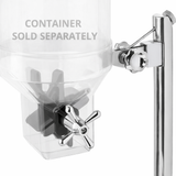 Close-up of a TableCraft cereal dispenser base with a cross-shaped paddle handle. The words CONTAINER SOLD SEPARATELY are printed on the clear upper section. The container itself is not included; only its shiny metal stand is shown.