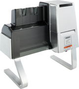 A commercial-grade Hobart 403-16 metal and plastic tenderizer machine with angled legs, black plastic safety guard, and a silver body. Designed for countertop food prep, it features a warning label on the front and US/Export configuration voltage specification.