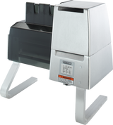 A Hobart 403-16 stainless steel commercial meat tenderizer machine features sturdy metal legs, a safety guard, and a warning label. Its industrial design is suited for US export configuration with the voltage specification marked clearly.