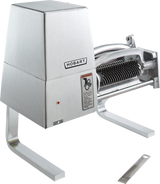 A stainless steel Hobart 403-1 meat tenderizer machine with cylindrical blade rollers, an on/off switch, voltage specification label, warning label, and a separate multi-pronged cleaning tool placed in front on a white background.