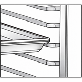 A metal baking sheet rests on angled racks of a Turbo Air PRO-77 bakery rack. The image is close up, showing the tray partially pulled out from the Tray Slide Kit, with empty horizontal slots above and below, against a white background.
