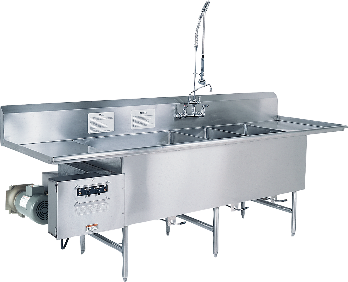A large commercial stainless steel sink with four deep basins, a tall backsplash, an industrial TurboWash faucet with a flexible hose, and a mounted garbage disposal unit on the left side, supported by metal legs.