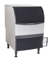 A cube style Scotsman Undercounter Ice Maker with a black front door, silver body, and black vented bottom panel. It stands on four black legs with a small side access panel open, revealing a mesh filter. 270 lb production capacity.